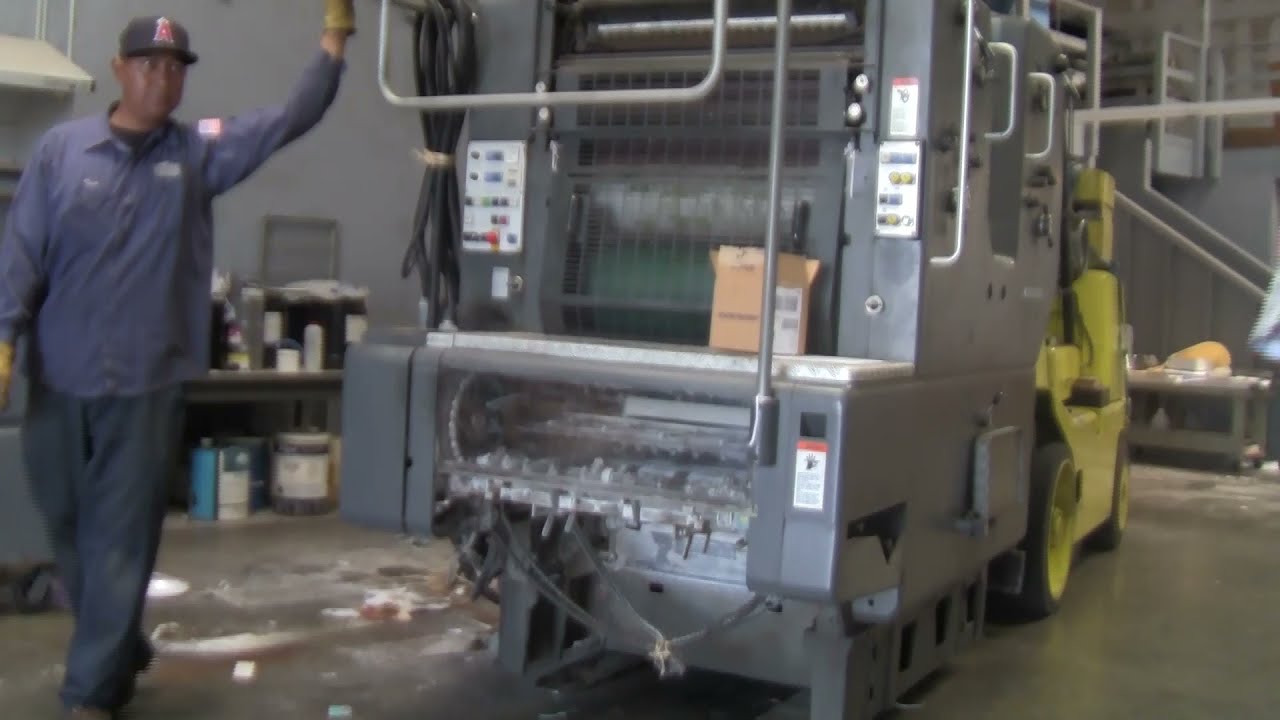 Loading A Heidelberg SORMZ 2 color Offset Printing Press into a Shipping Container