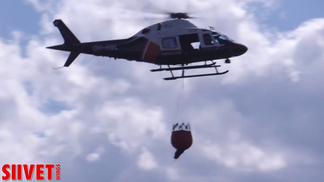 AW 119 Ke Koala Helicopter Flight Display With Aerial firefighting - FinAF 100 Years