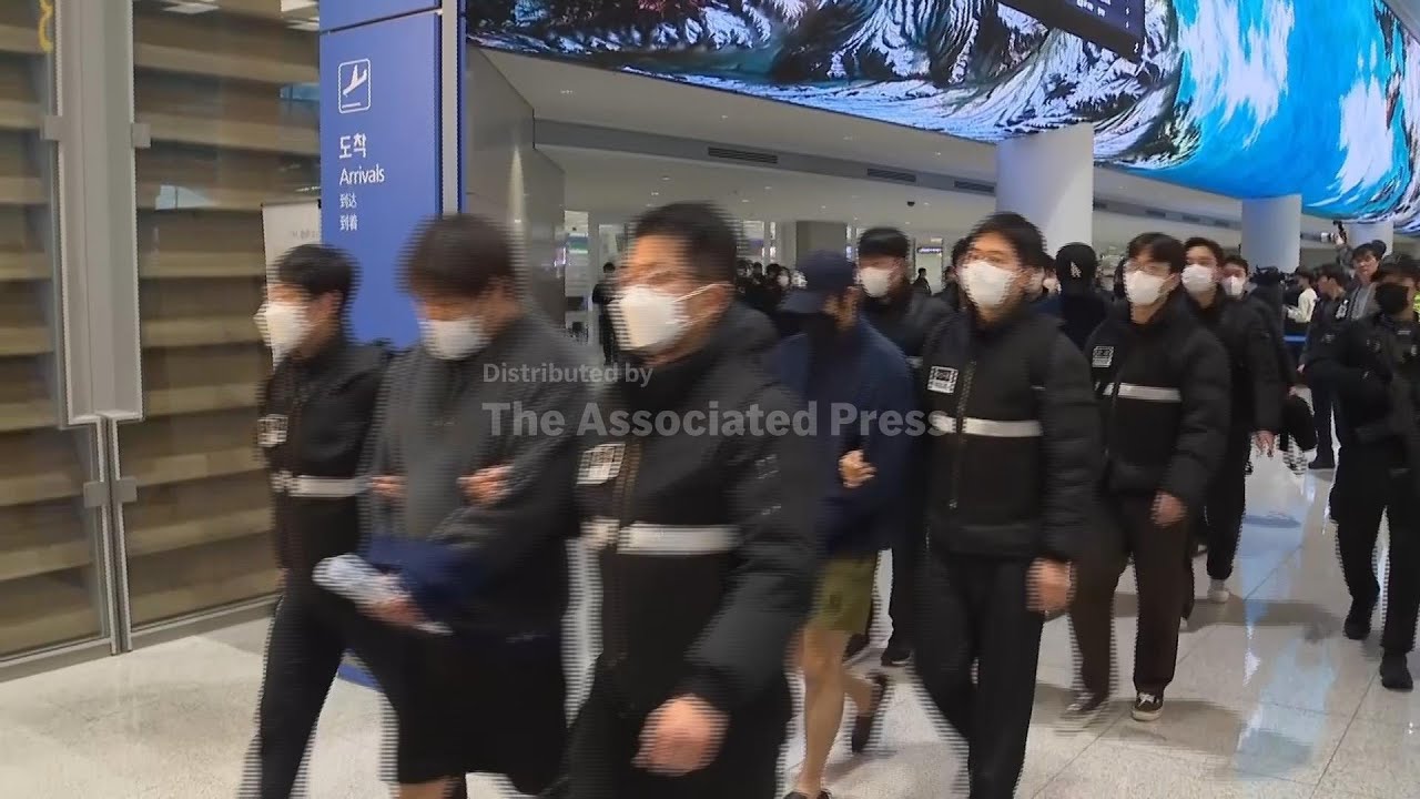 73 South Korean online scam suspects detained in Cambodia return home to face probes