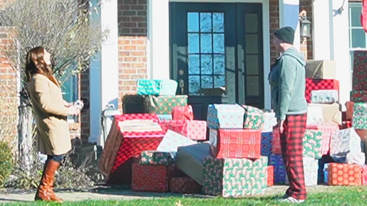 Surprising Strangers With 100 Christmas Presents