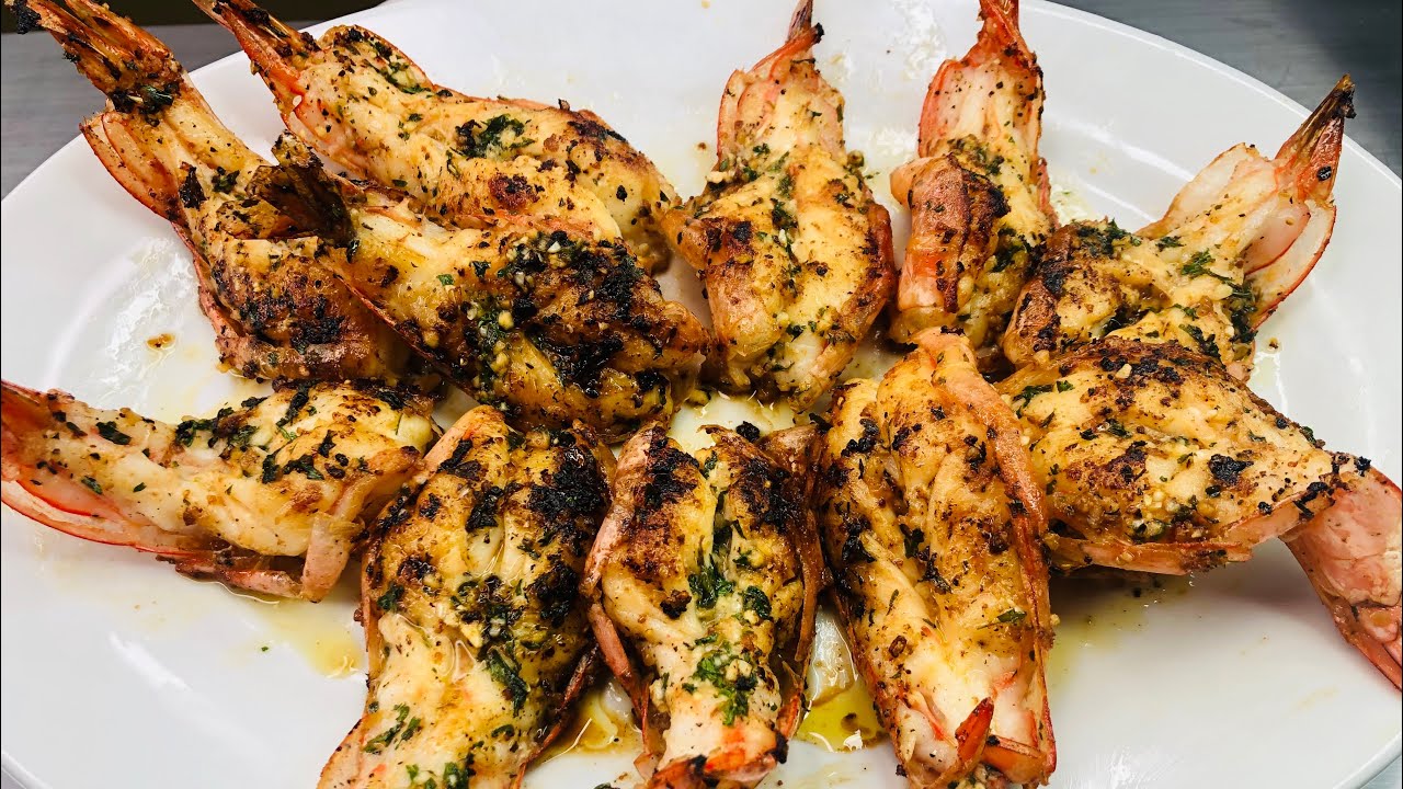 CAMARONES CON MANTEQUILLA AJO Y UN TOQUE DE VINO BLANCO!!