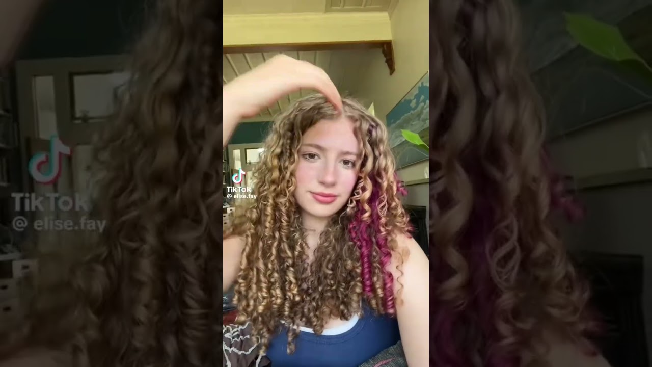 i wanna do a blue peekaboo on my hair🥹🥹. #fyp #tiktok #notminr #curlyhair #pinkhair #hairdye