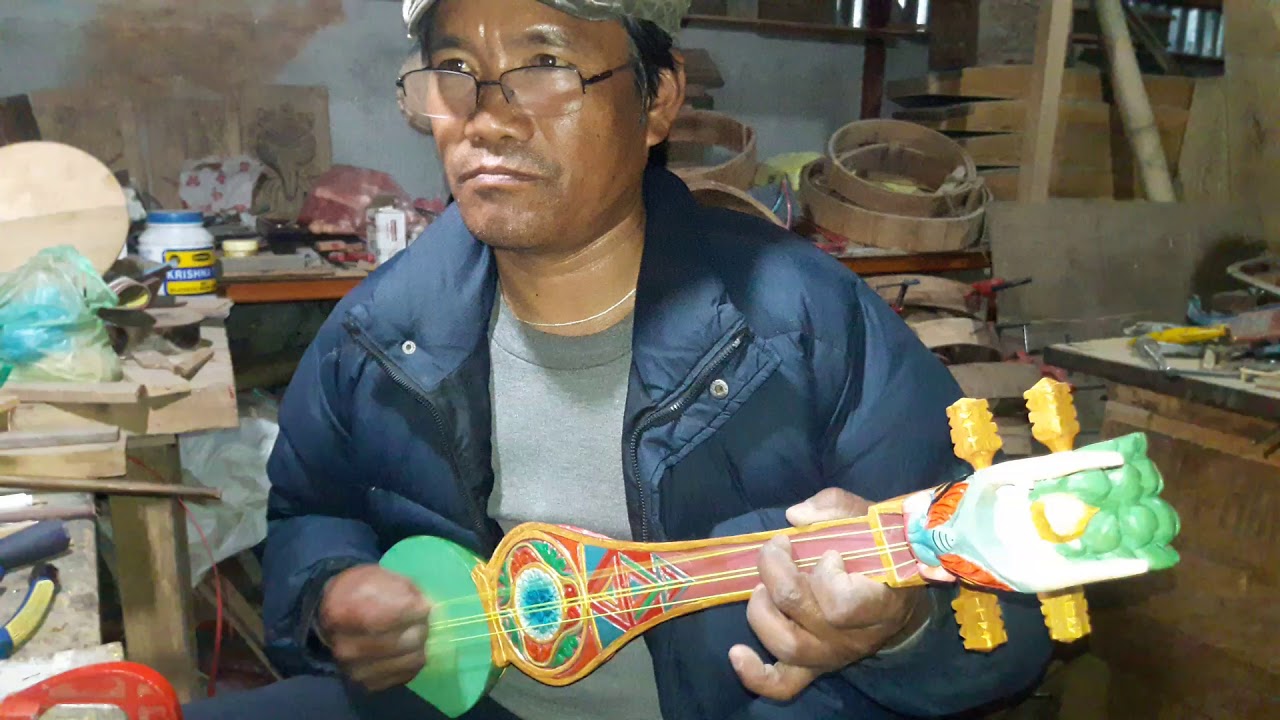Cultural Instrument Tungna With Dhawa Wangel Moktan