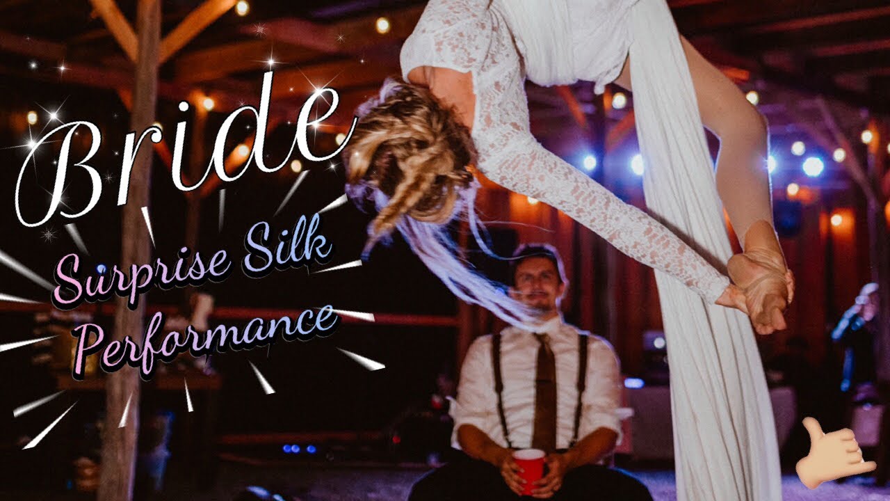 Bride Surprises Groom and wedding guests with aerial silks performance!