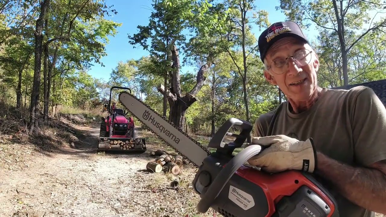 Episode 137- Trying out the new Husquvarna PowerAxe 350 chain saw. Removing trees causing damage.