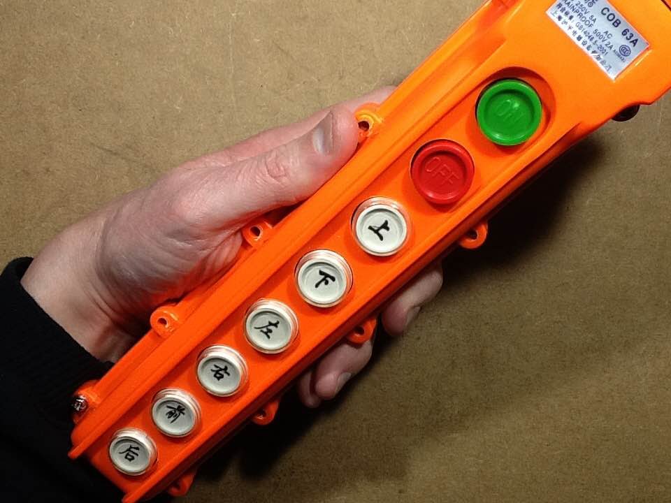 Inside a Chinese crane pendant control station.