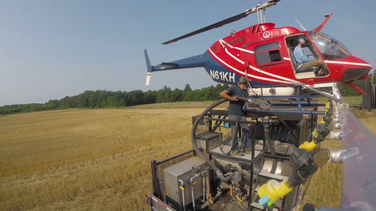 Bell 206 spraying crops