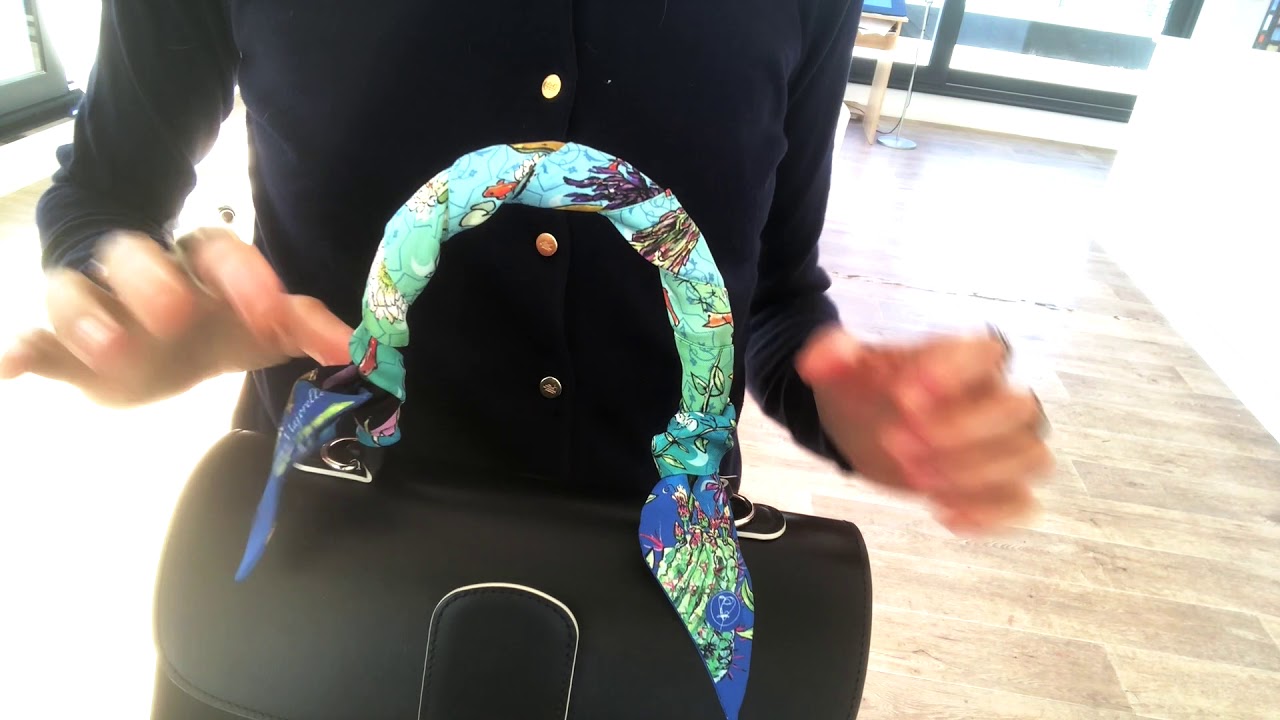 Porter un Nastrito (Twilly) autour de la anse de son sac