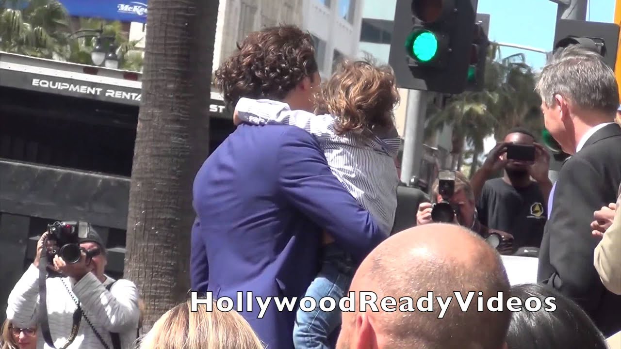 Orlando Bloom has a father-son moment at his star ceremony in Hollywood