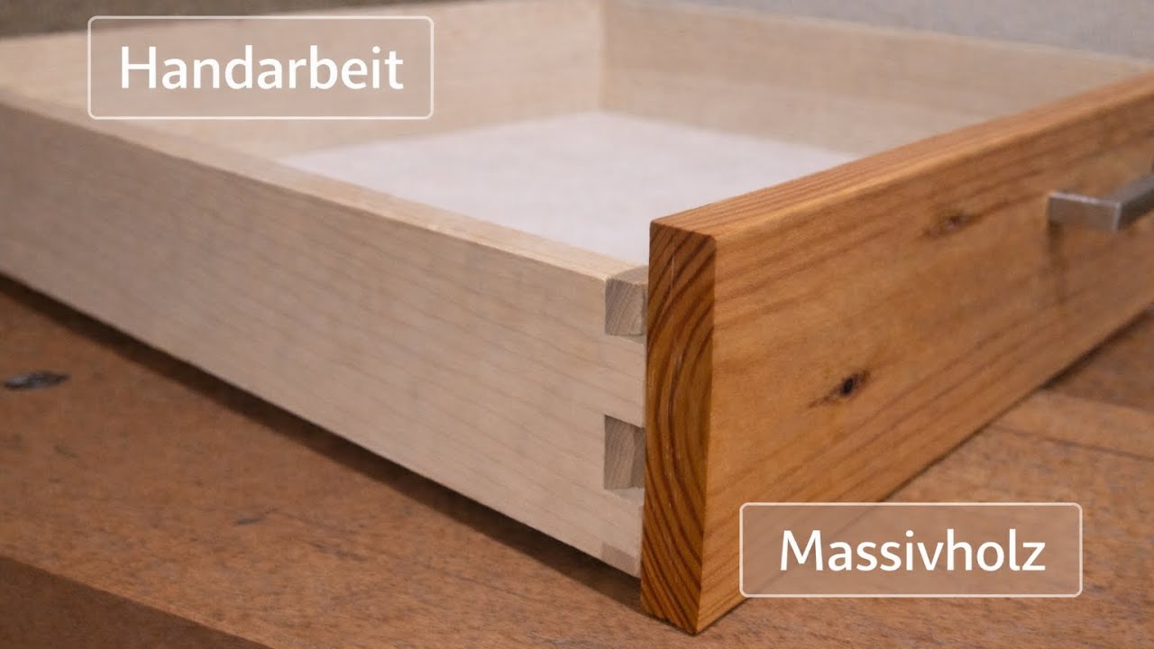 Schublade aus Massivholz mit Schwalben
