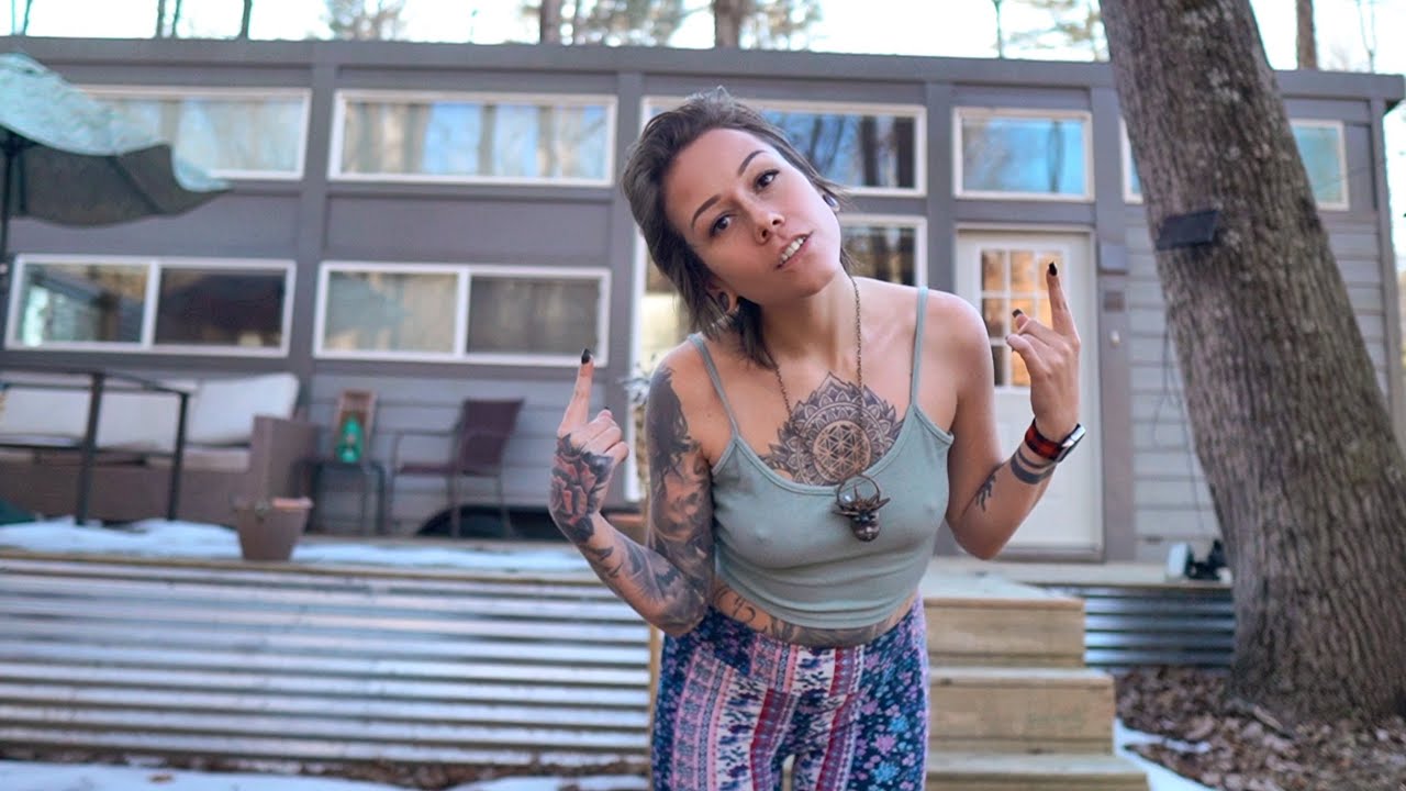 alone in an off grid tiny house in the woods