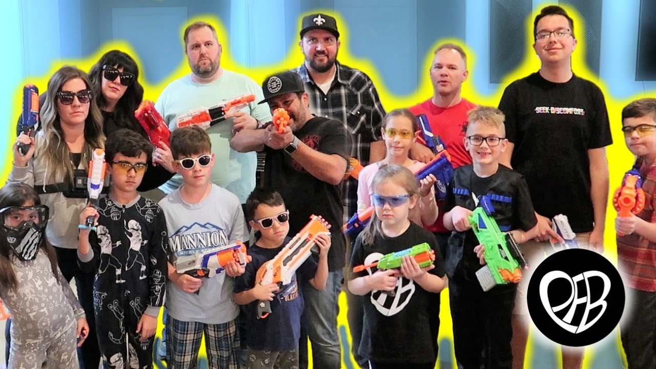 Four FAMILIES Battle in EPIC NERF WAR with 20 PEOPLE | PHILLIPS FamBam Vlogs