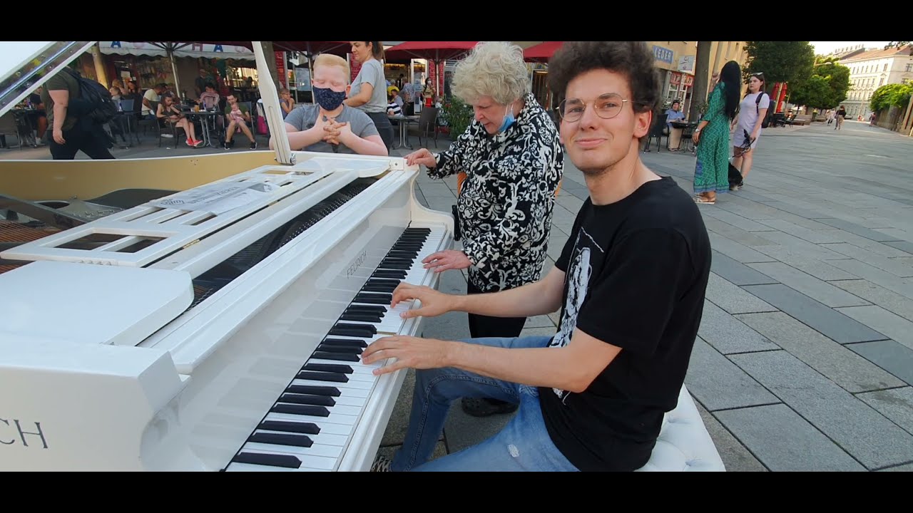 Street Pianist and crazy Grandma playing 