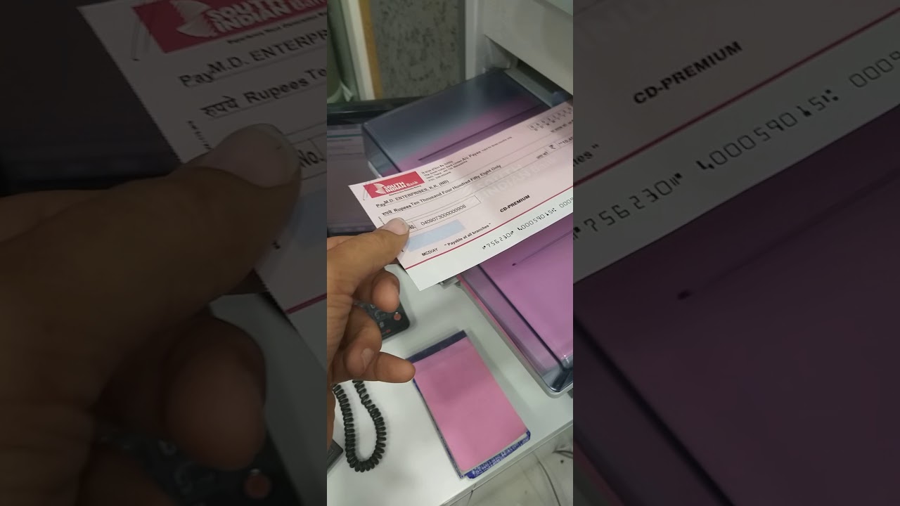 the way of inserting the cheque in to the printer for a cheque print side