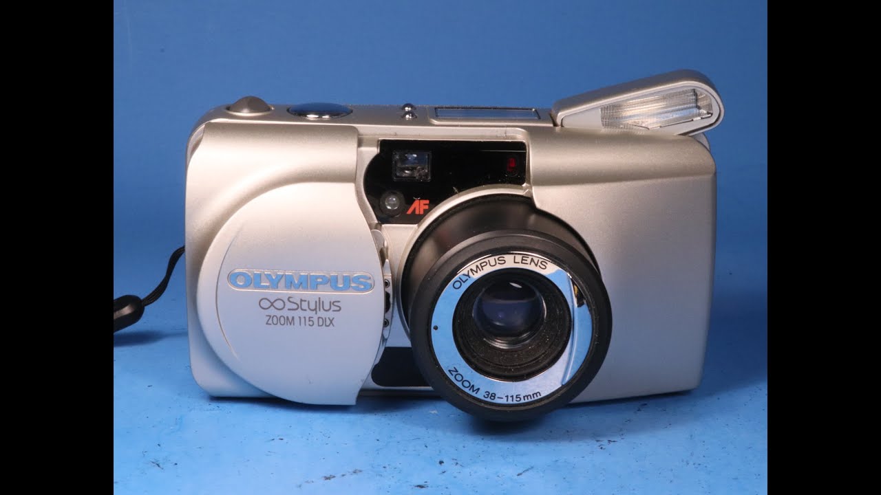 Olympus Infinity Stylus Zoom 115 DLX 35mm Film Camera Being Tested