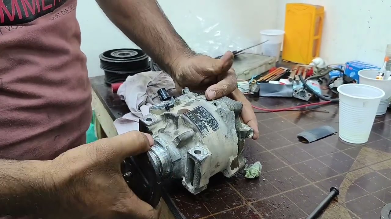 how to repair AC compressor Mitsubishi Lancer