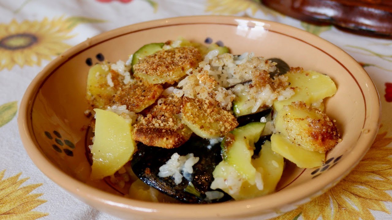 Pasta Grannies cook a potato, mussel and rice bake called Tajedda