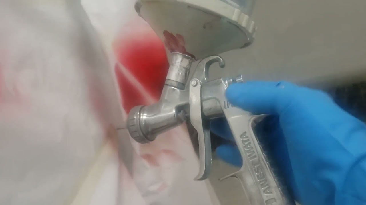 Spraying a candy apple red P Bass