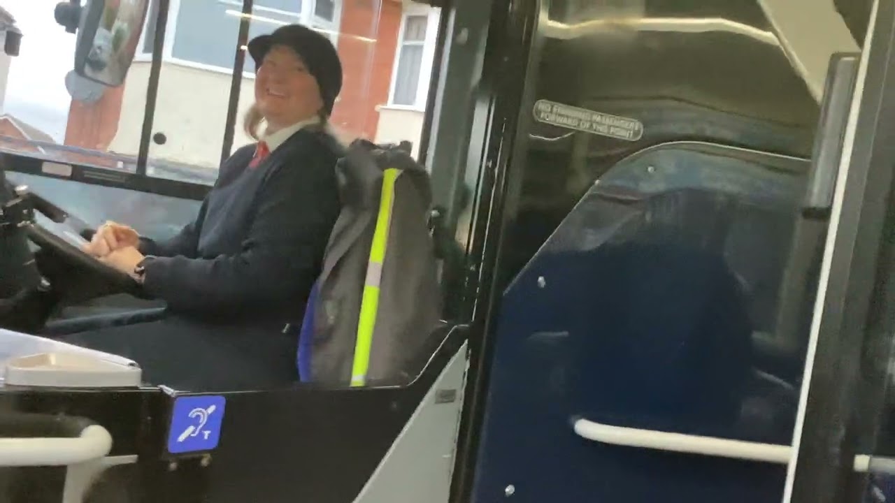 Us getting off More bus (HF66 CEN) 5 to Kinson at Howeth Road bus stop (13/02/2026)