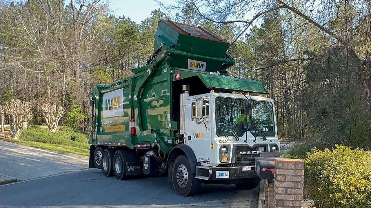 Brand New Waste Management CNrG Heil Sierra front loader garbage truck w/ a tag axle 