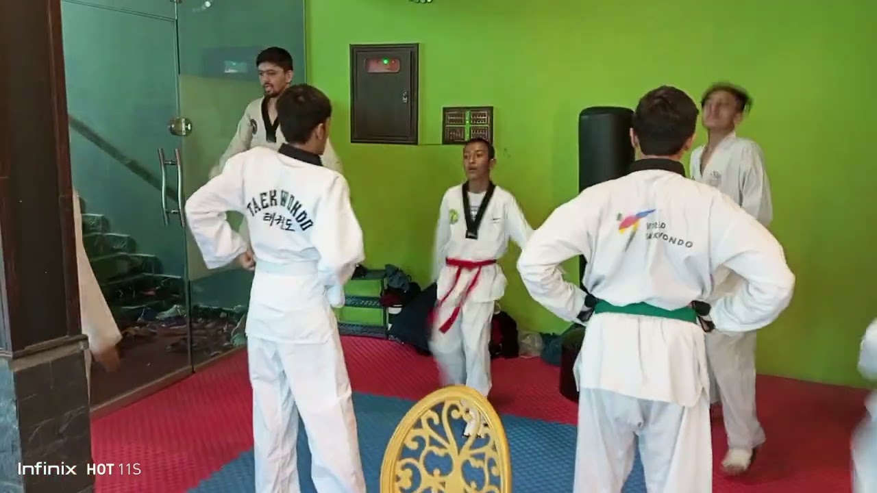 Karachi Taekwondo Academy's belt promotion ceremony pre warmup