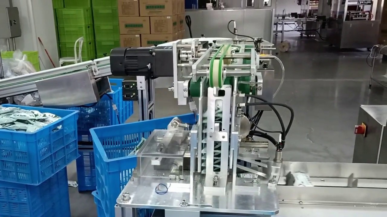 Cartoning machine connect with Stretch banding Machine