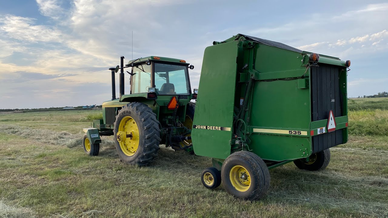 Round baling hay JD 535