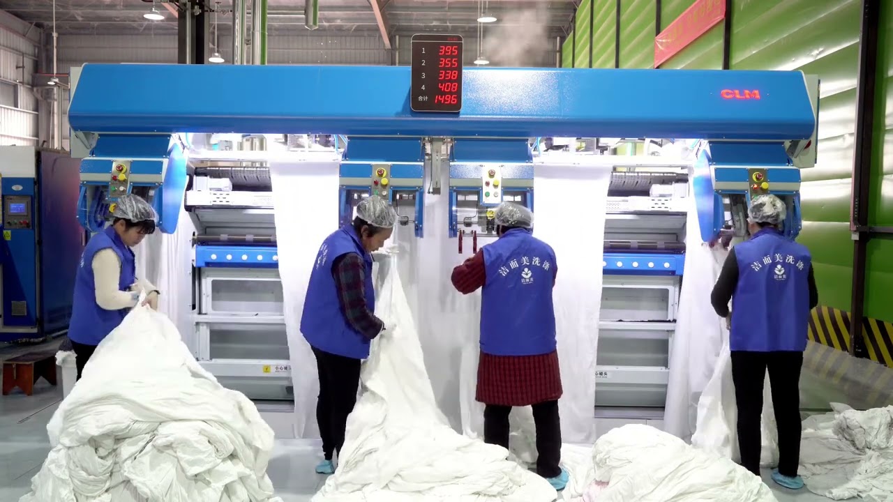 CLM new installed laundry of tunnel washers and high speed flatwork lines. Towel folder