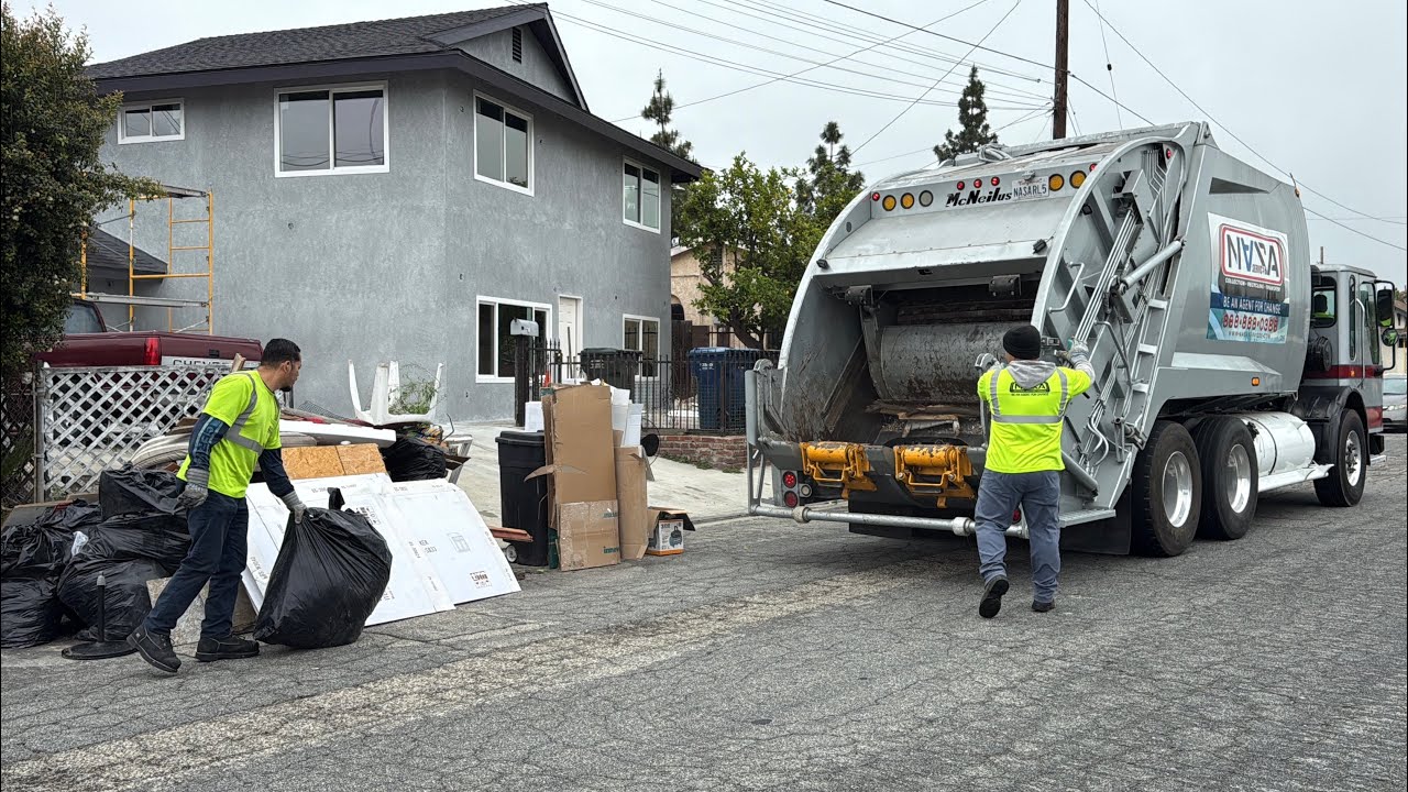 Nasa Services Condor McNeilus Rear Loader Garbage Truck Packing Bulk at the Cleanup