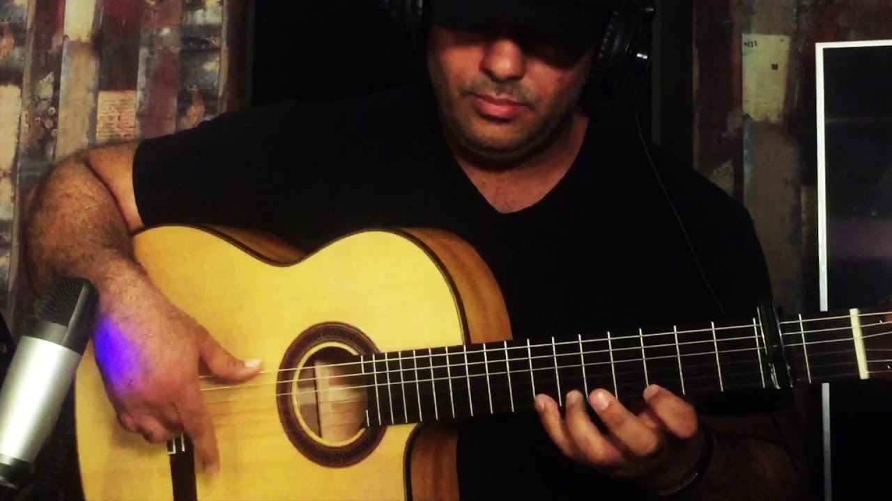 Un Hombre guitar
