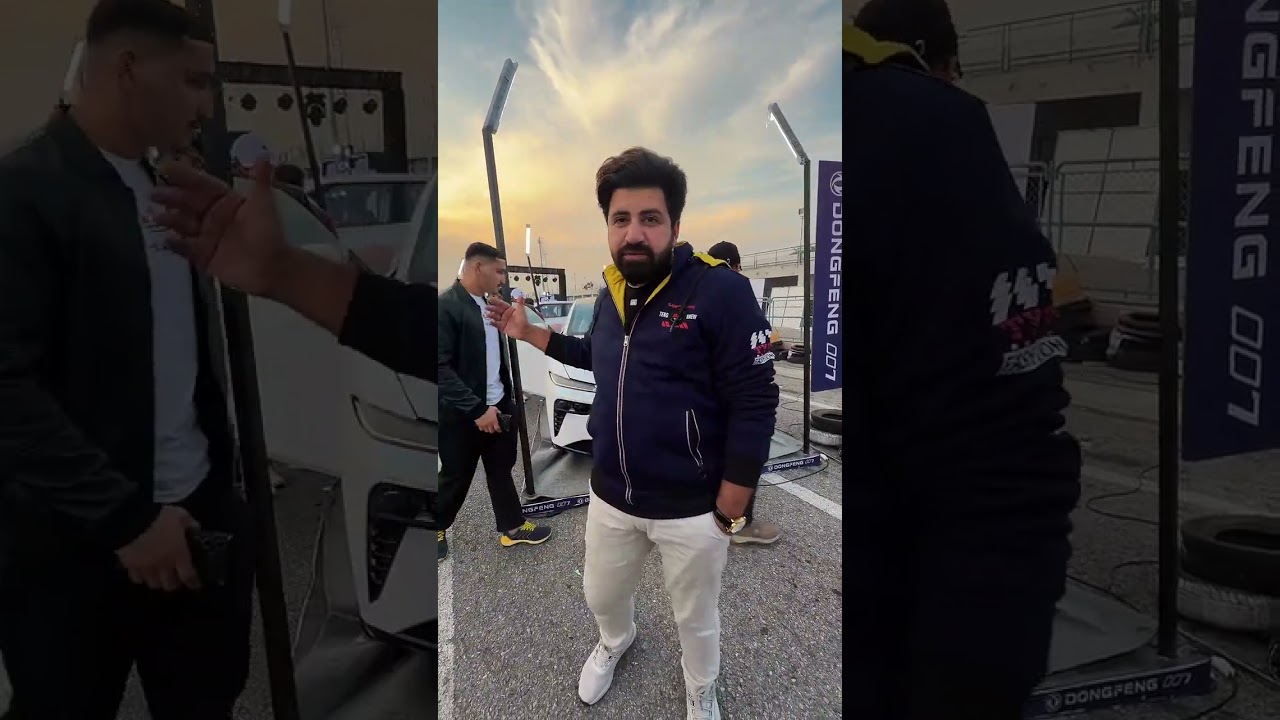 A closer walkthrough of the Dongfeng 007 as a brand representative highlights the car on display.