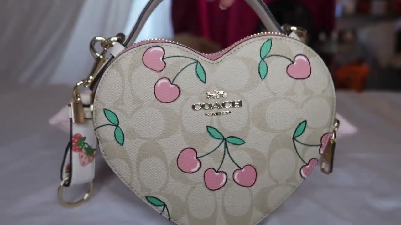 COACH HEART BAG WHAT FITS !!!????