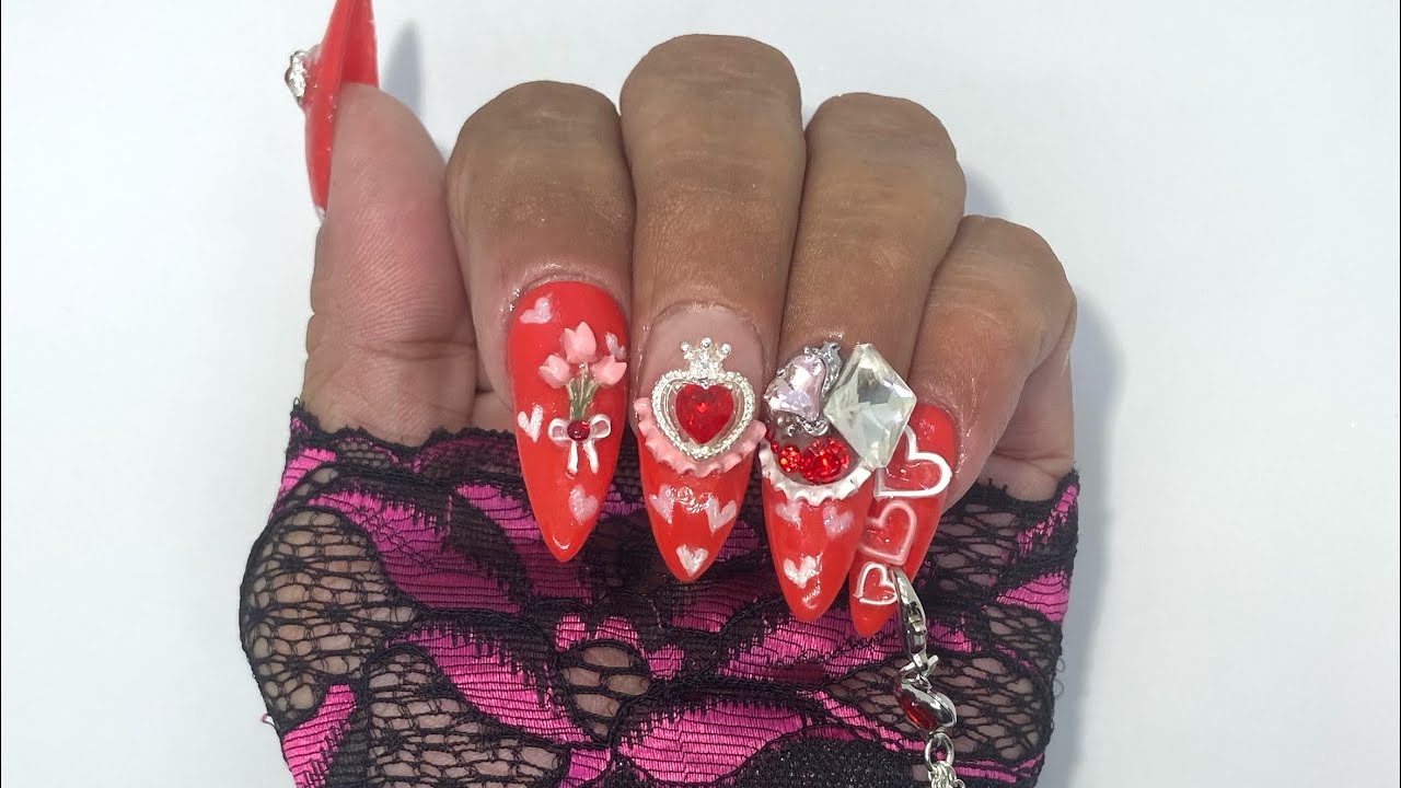 Valentine’s Day nail art / DIY charm / 3D nail art / pink and white hearts / bling / pierced nail 