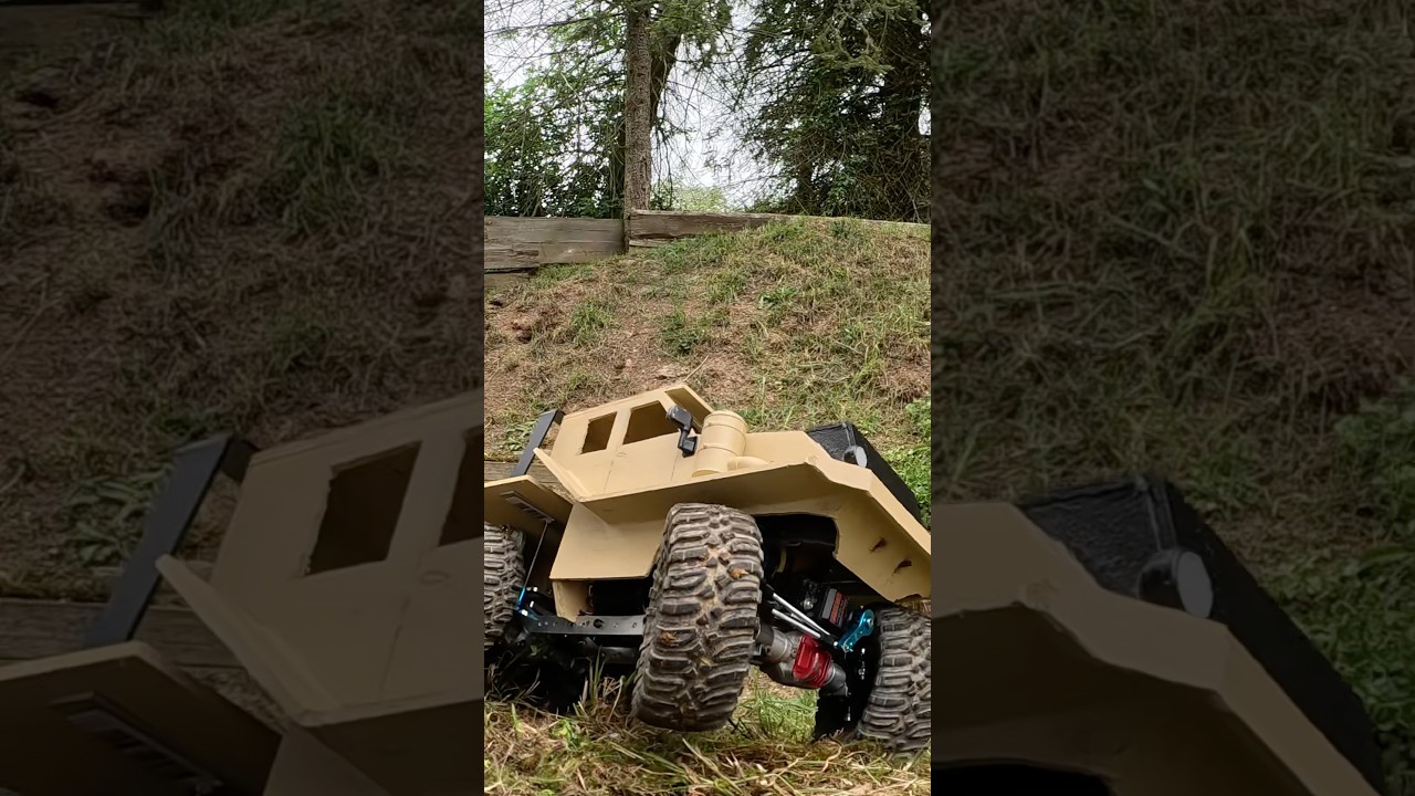 MODEL TRUCK TRIAL KING HAULER 6X6 ON RACE TRACK IN BRECHEN 