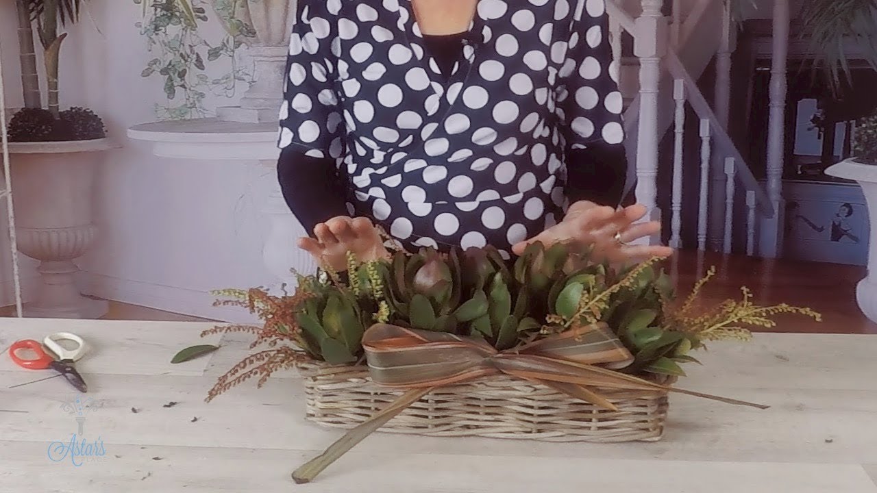 A Simple Floral Arrangement using Flax, Lily of the Valley and Lucadandrum
