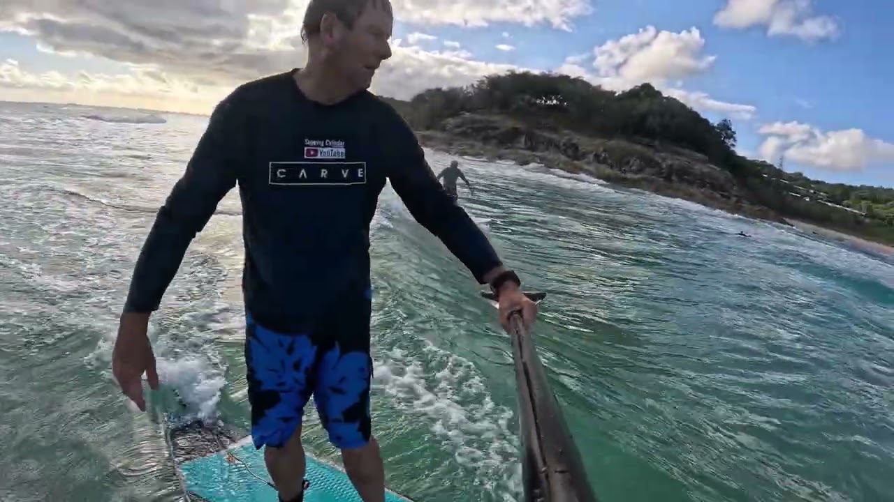Supping Cylinder , What's the title for this one ? Sup , surfing , prone foil & dolphins