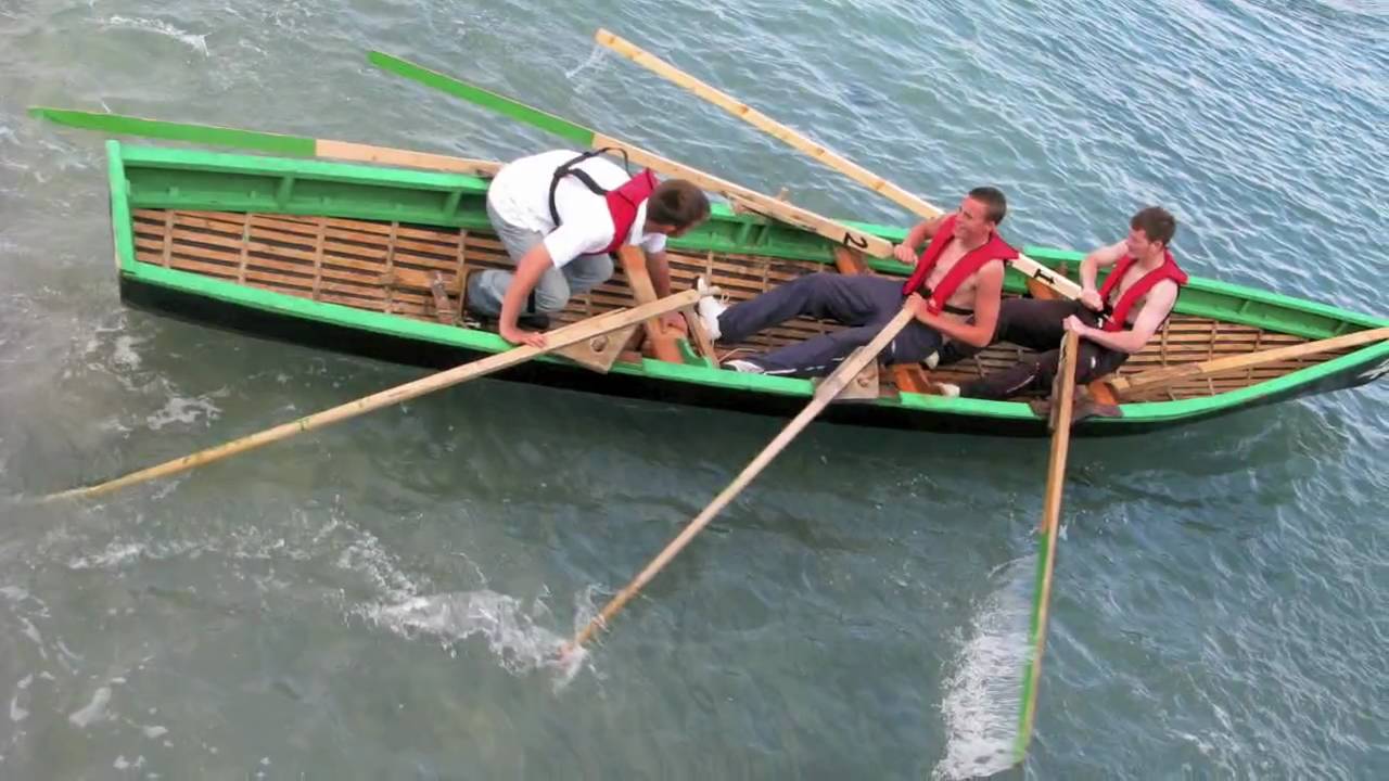 Racing currachs off Inis Meain