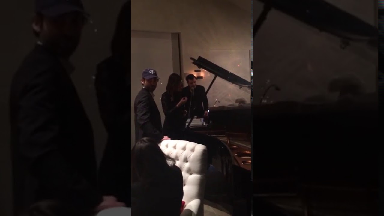 Seth MacFarlane dancing with girl at 2015 Christmas party