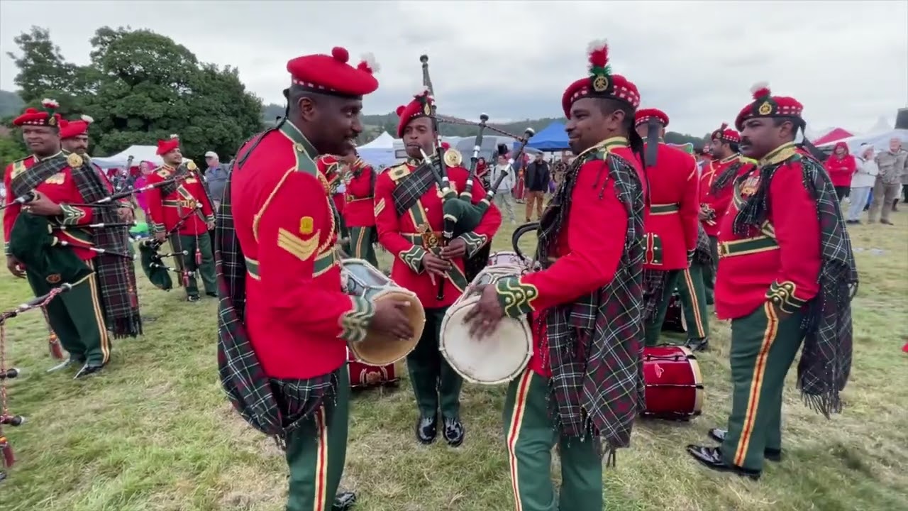 Royal Army of Oman Pipe Band  entertain the crowds at Bridge of Allan Highland Games 2024
