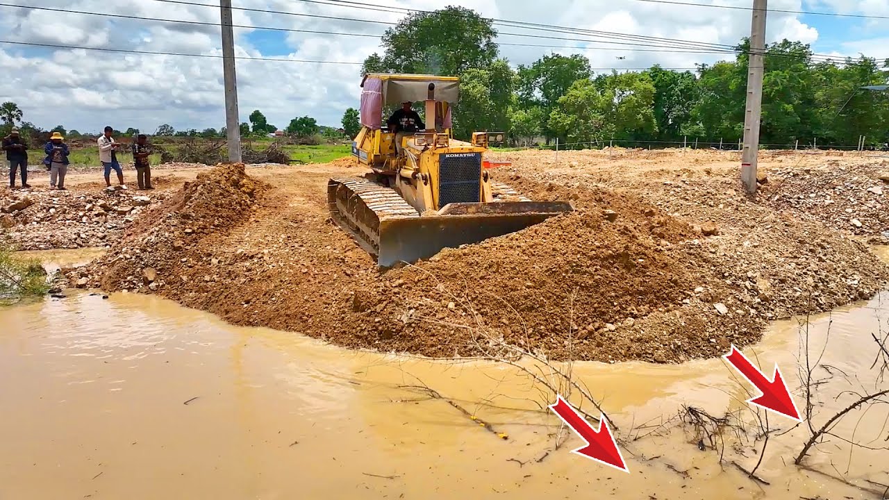 Beware!. New Dumping Task! 25 Tons of Rock Truck Dumping Rock Across the Canal & Dozer Pushing Rock