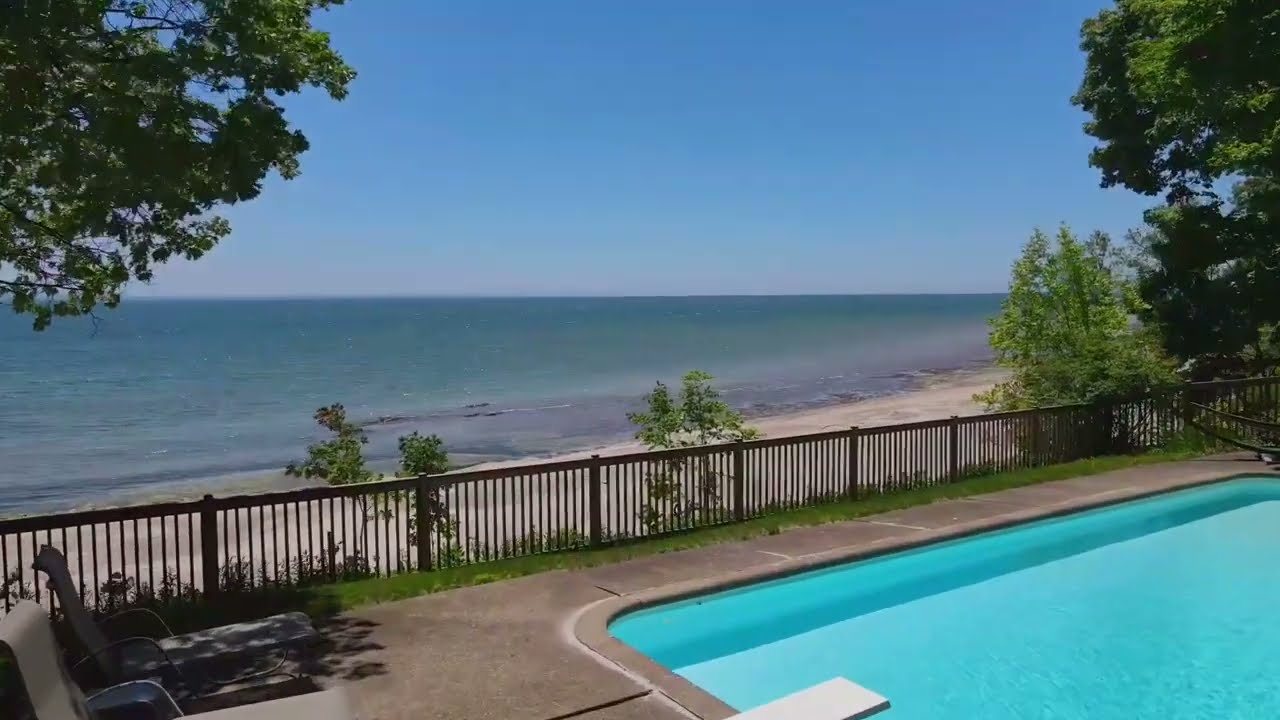 1705 MacDonald Dr  | Luxury Lakeside Living with Private Beach