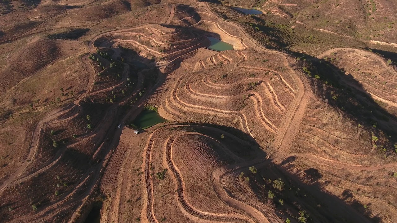 Flying over a water-landscape designed farm in Portugal II