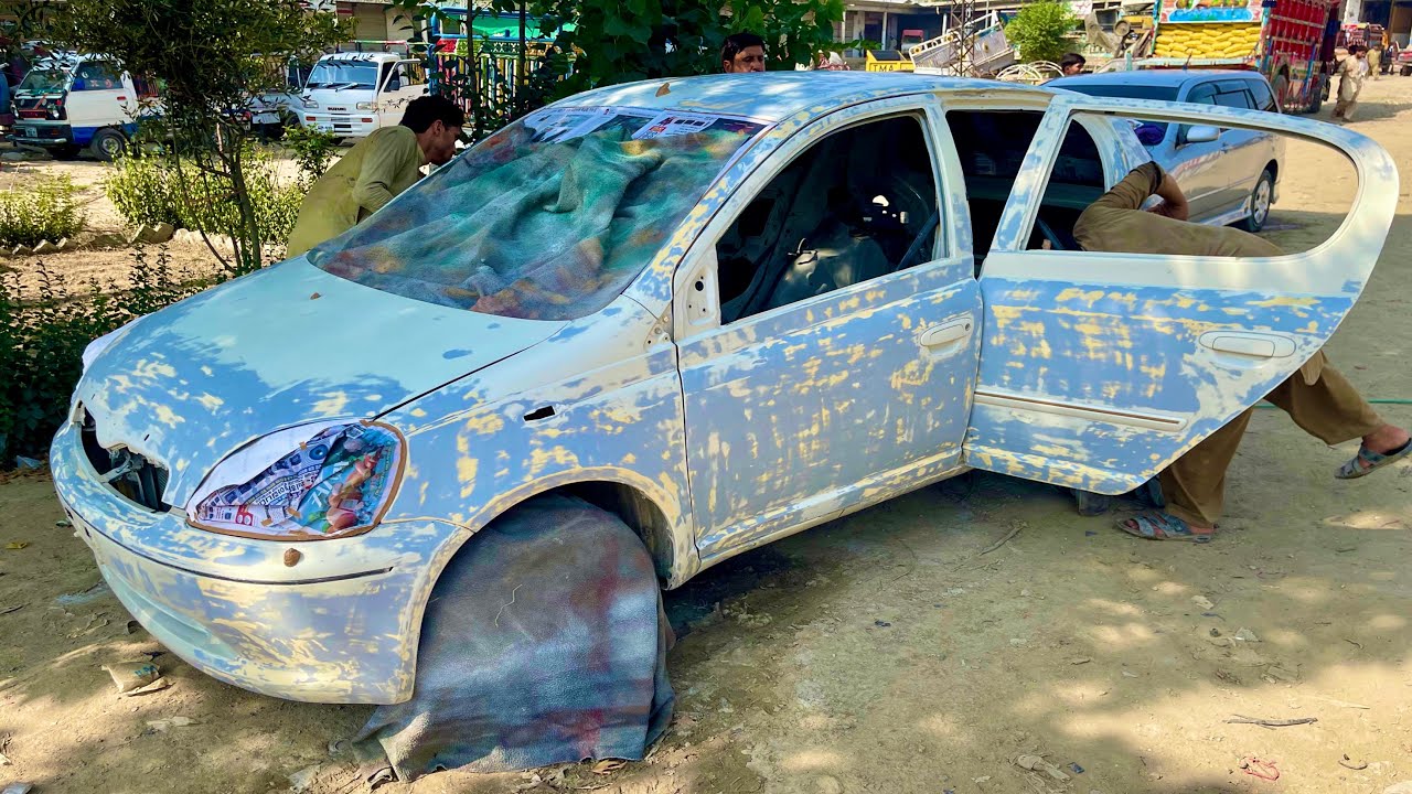 Old Model Toyota Vitz Car denting & Painting Full Restoration & Repairing in The Local Workshop