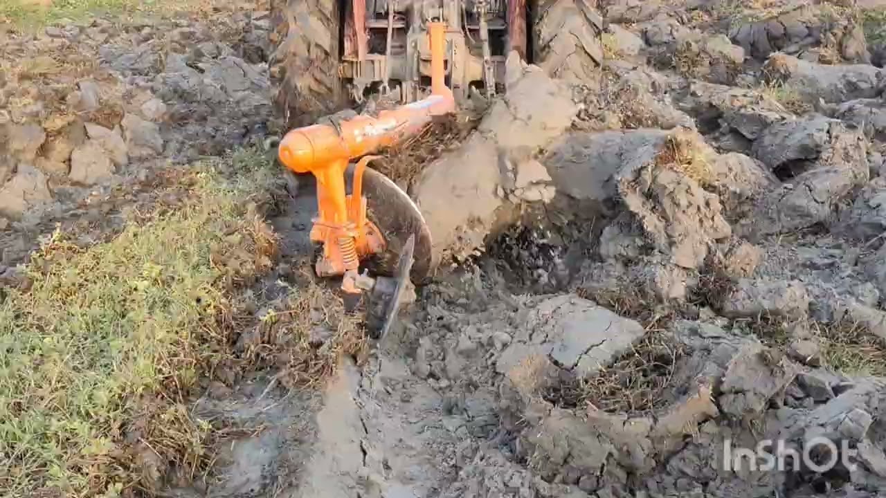 Massey 9000 and Arjun 555 plow