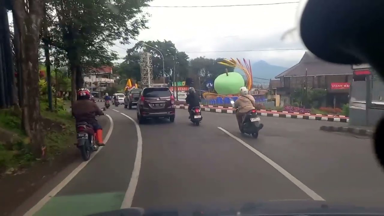 INDONESIA Driving morning city road Batu east java