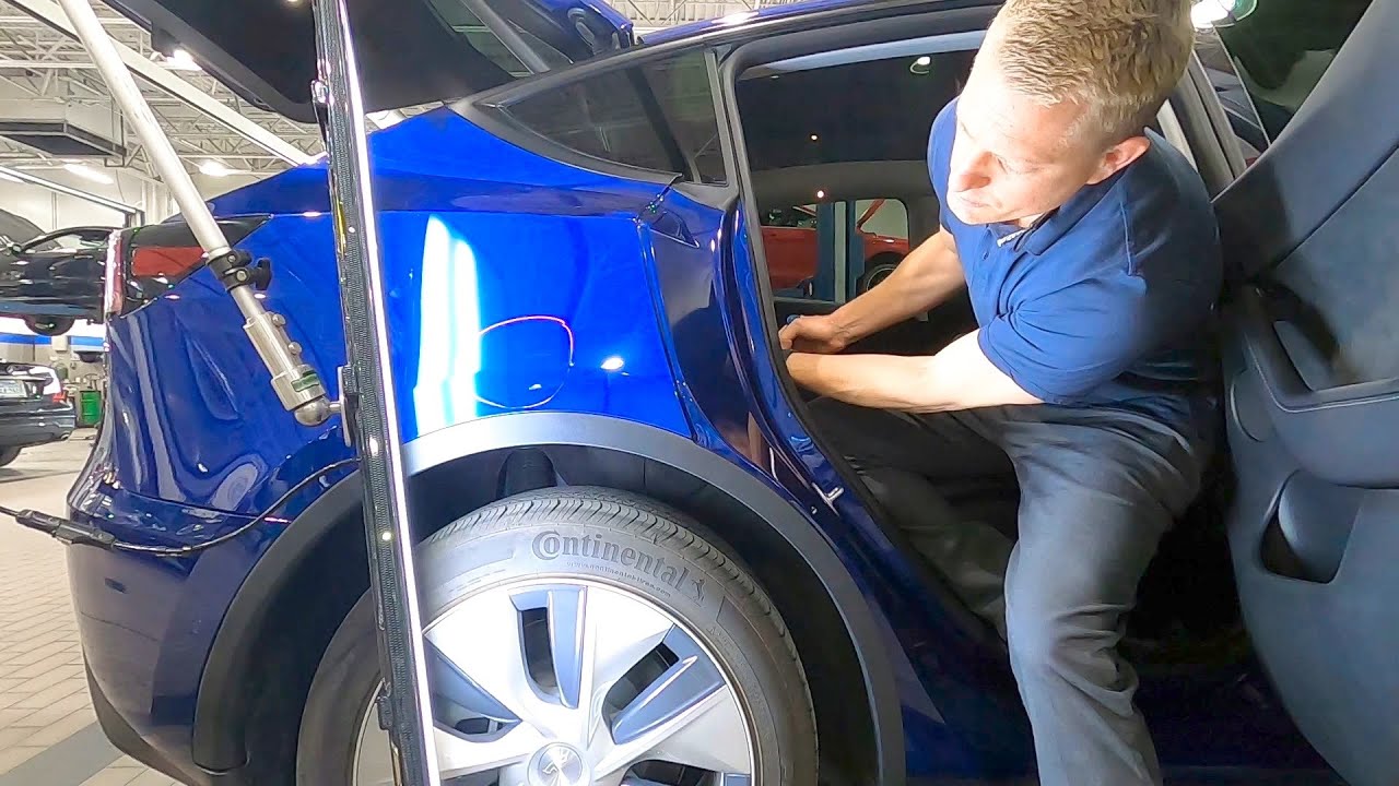 Tesla Model Y dent removal above rear wheel