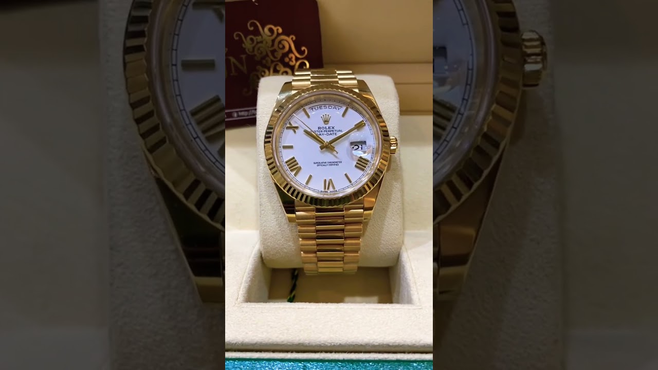 Rolex President DayDate 18k solid gold with a stunning white Roman dial