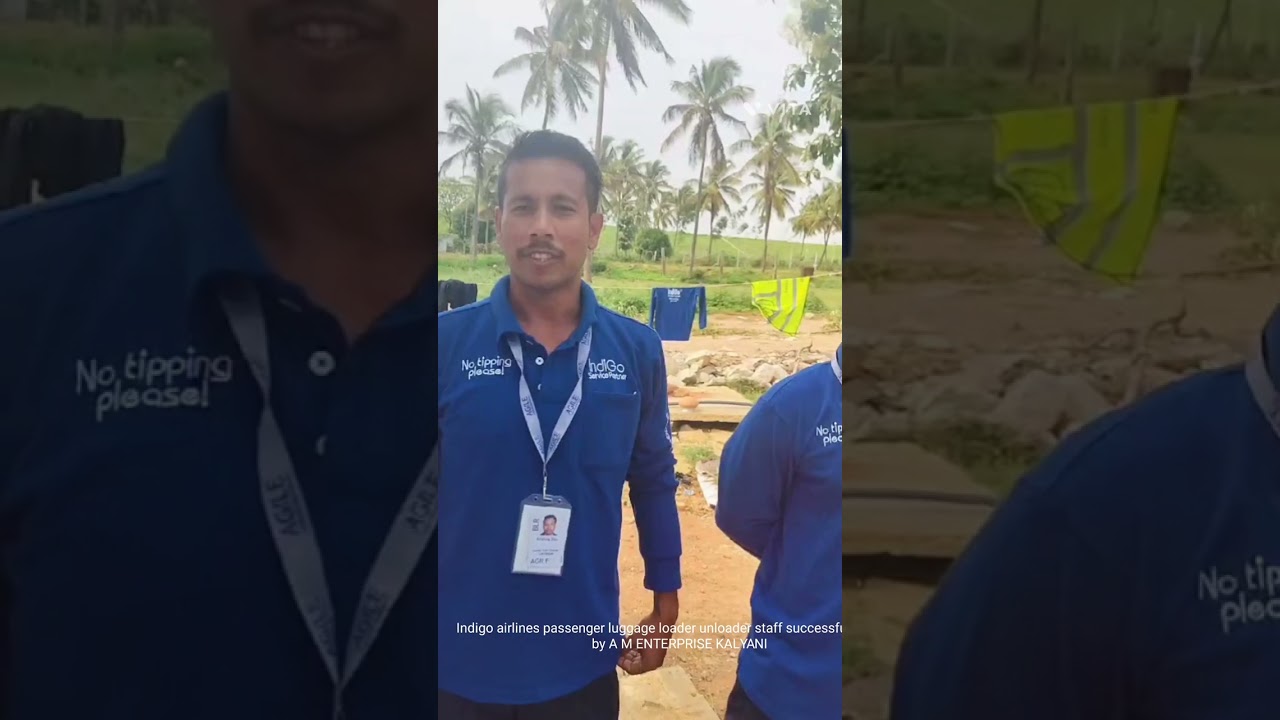 Indigo Airlines passenger luggage loader successfully joining . Bangalore International Airport .