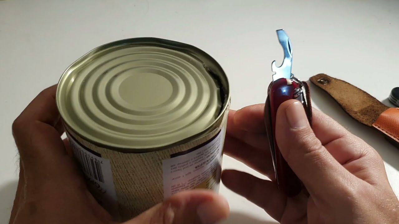 Canivete Victorinox abrindo latas. Abridor de latas Victorinox.