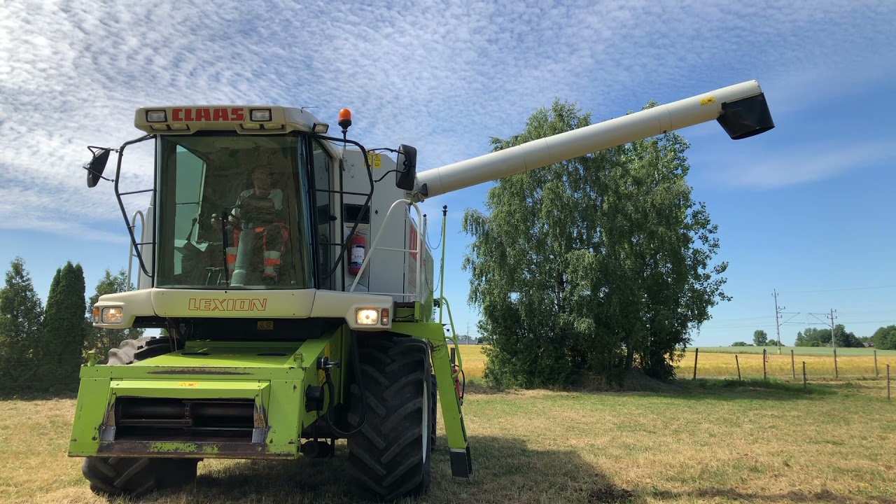 Köp Tröska Claas Lexion 405 med 18 fots skärbord på Klaravik